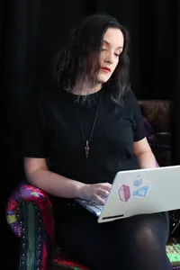 Oodri working on her computer